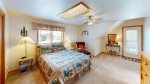 Spacious room with your own upper deck, this bedroom with a queen bed is just right for you.
